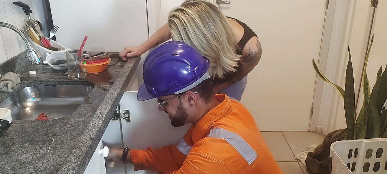 A beautiful Brazilian woman calls plumber