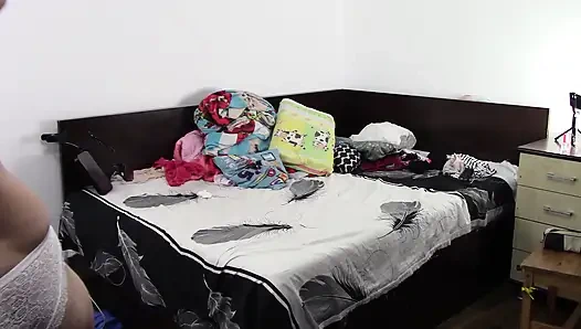 Amateur wife has fun trying on clothes and cutting them