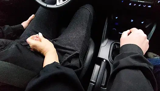 Amateur MILF gives a handjob to a taxi driver and teases him in the car, in public