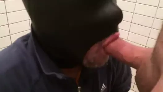 Feeding a load to the masked cumslut 2