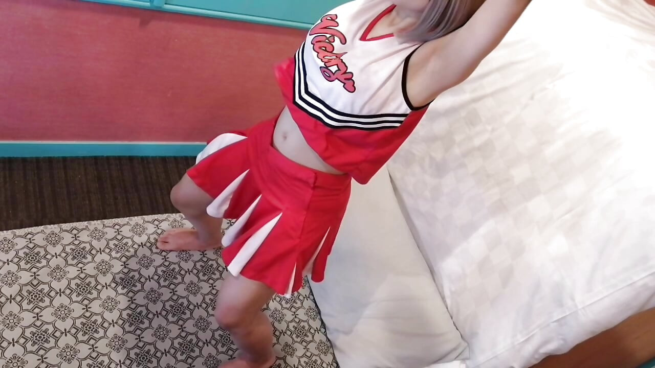 A cute, busty married woman performs exercise 4 in an erotic cheerleader costume. Peeking down from above. Home made amateur Private Shoot