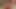 Giyinik camwhore sarkık göğüsleri ile dalga geçiyor ve kedi dudaklarını losyonları