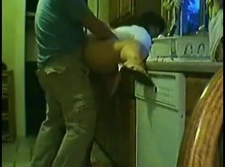 Singando en la cocina