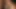 Lora Croft dizlerinin üzerinde yarak emiyor ve kendini parmaklıyor