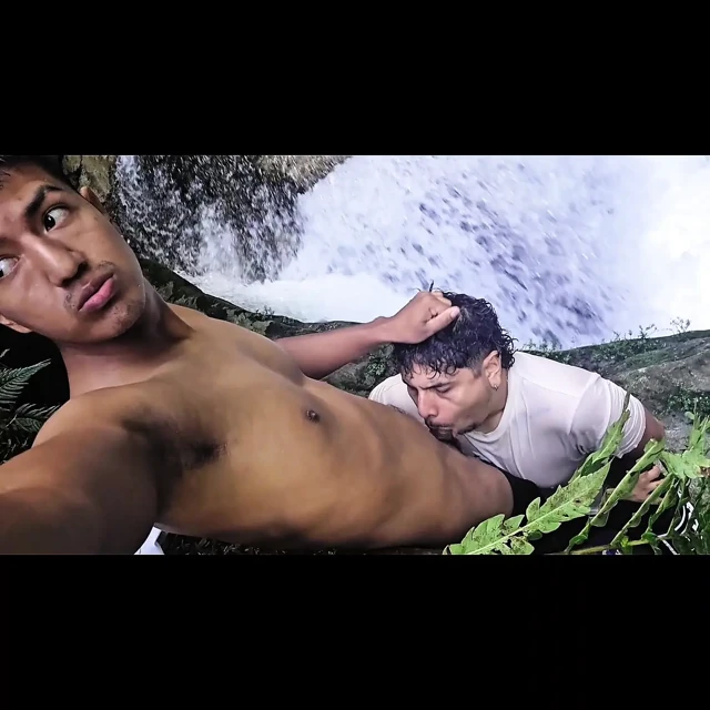 Indian man fucking young gay man in a waterfall
