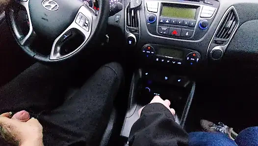 Amateur MILF gives a handjob to a taxi driver and teases him in the car, in public