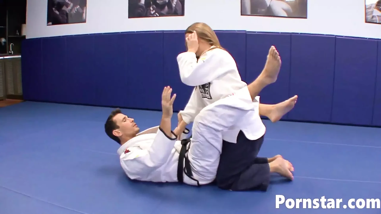 Megan Fenox does karate and with handsome coach