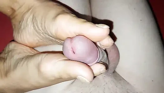 Real mature stepmom with sexy legs and painted nails gives her stepson a footjob at home