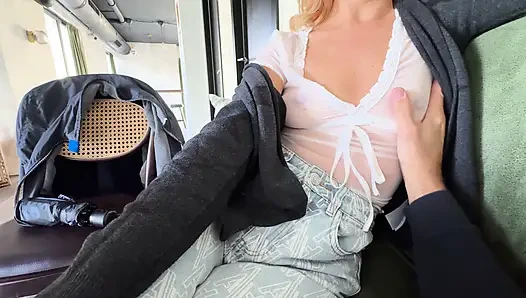 Drinking coffee in a see through shirt exposing pierced nipples in public cafe while my husband touches my boobs