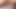 Genç esmer kırmızı dildoyla kendini tatmin ediyor