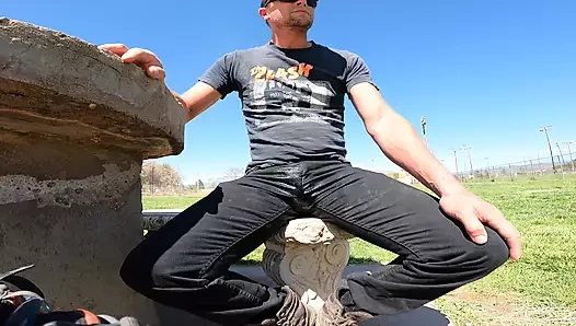 Pissing cum-stained punk jeans in a public park