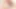 Sarışın ve esmer bebek yatakta pembe bir yapay penis ile oynuyor