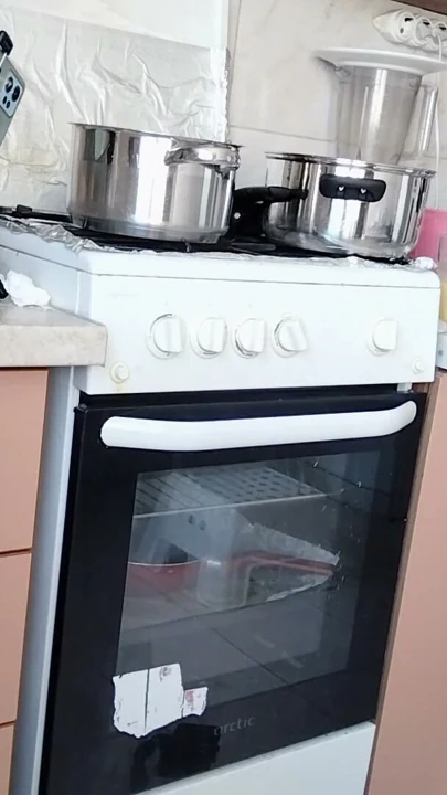 Sexy Latina nude in the kitchen. Sexy naked wife prepares food in the kitchen. | Clip 1
