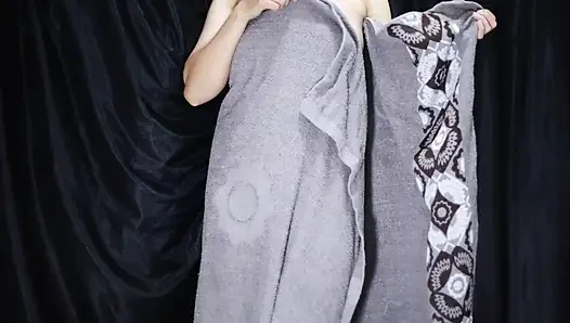 A young girl is trying on a new pair of lingerie