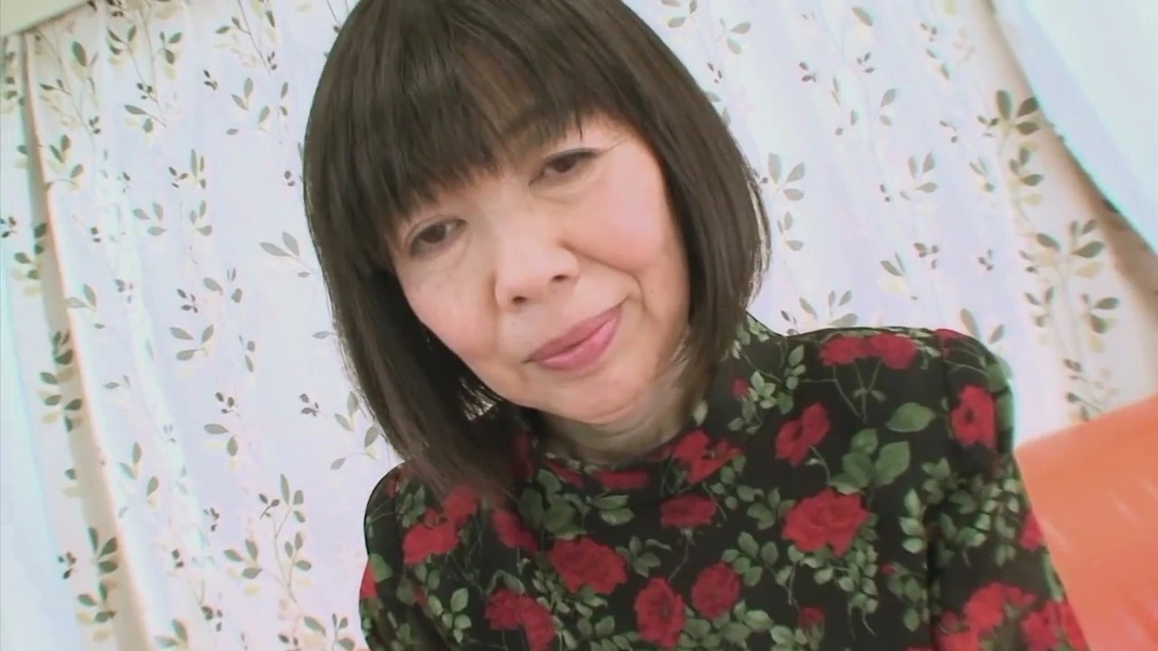 Asian MILF enjoys a big cock