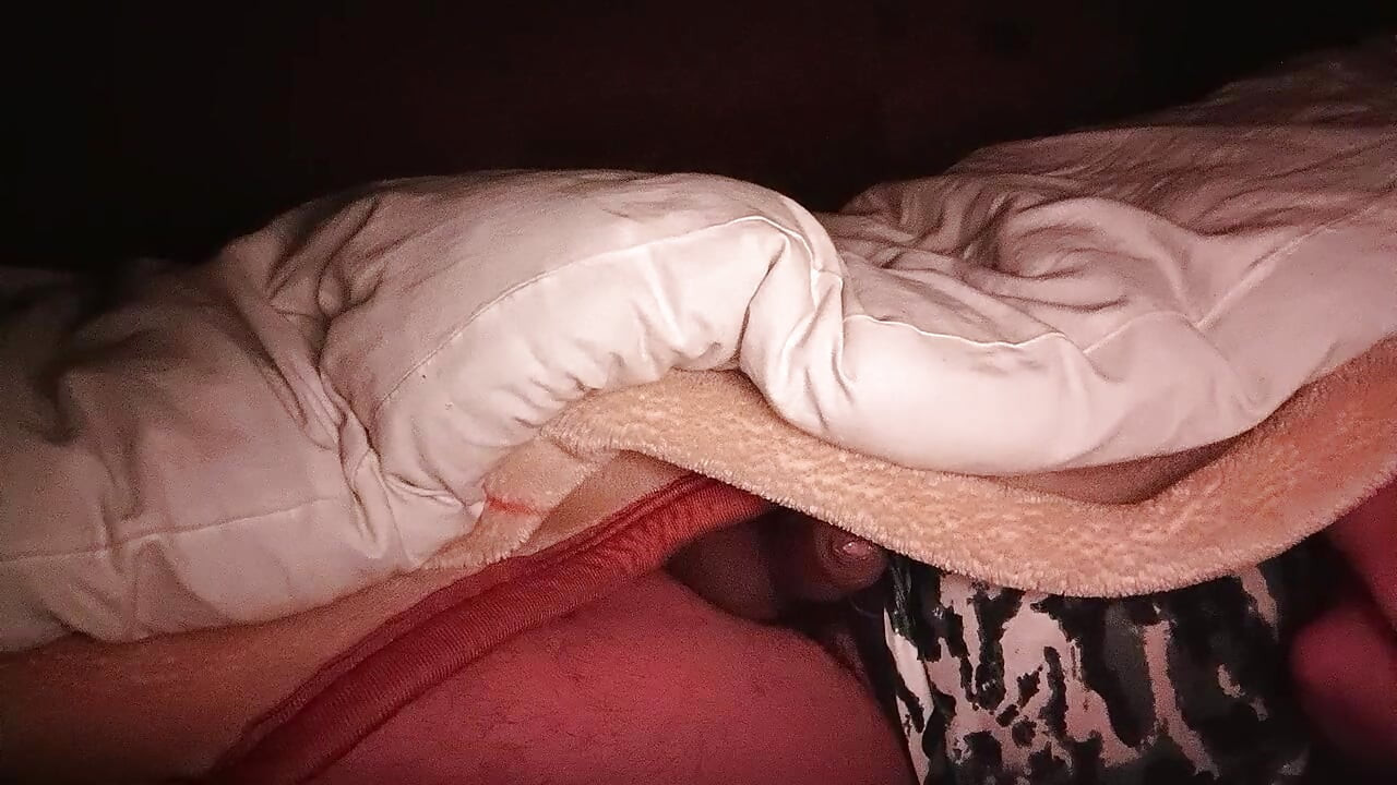 A Indian boy was fucking herself at midnight on bed