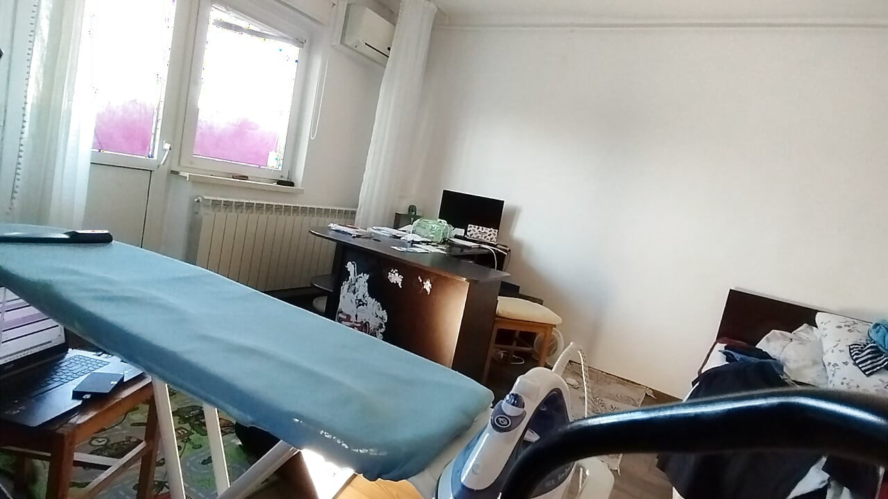 Amateur woman doing housework naked Sexy and naughty wife trying on clothes she cuts.
