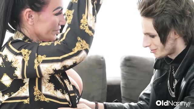 Inked Mature With Big Tits Gives Blowjob To Emo Stud