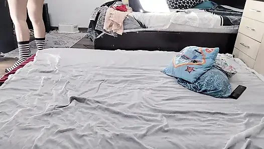 Sexy brunette doing naked chores around the house.