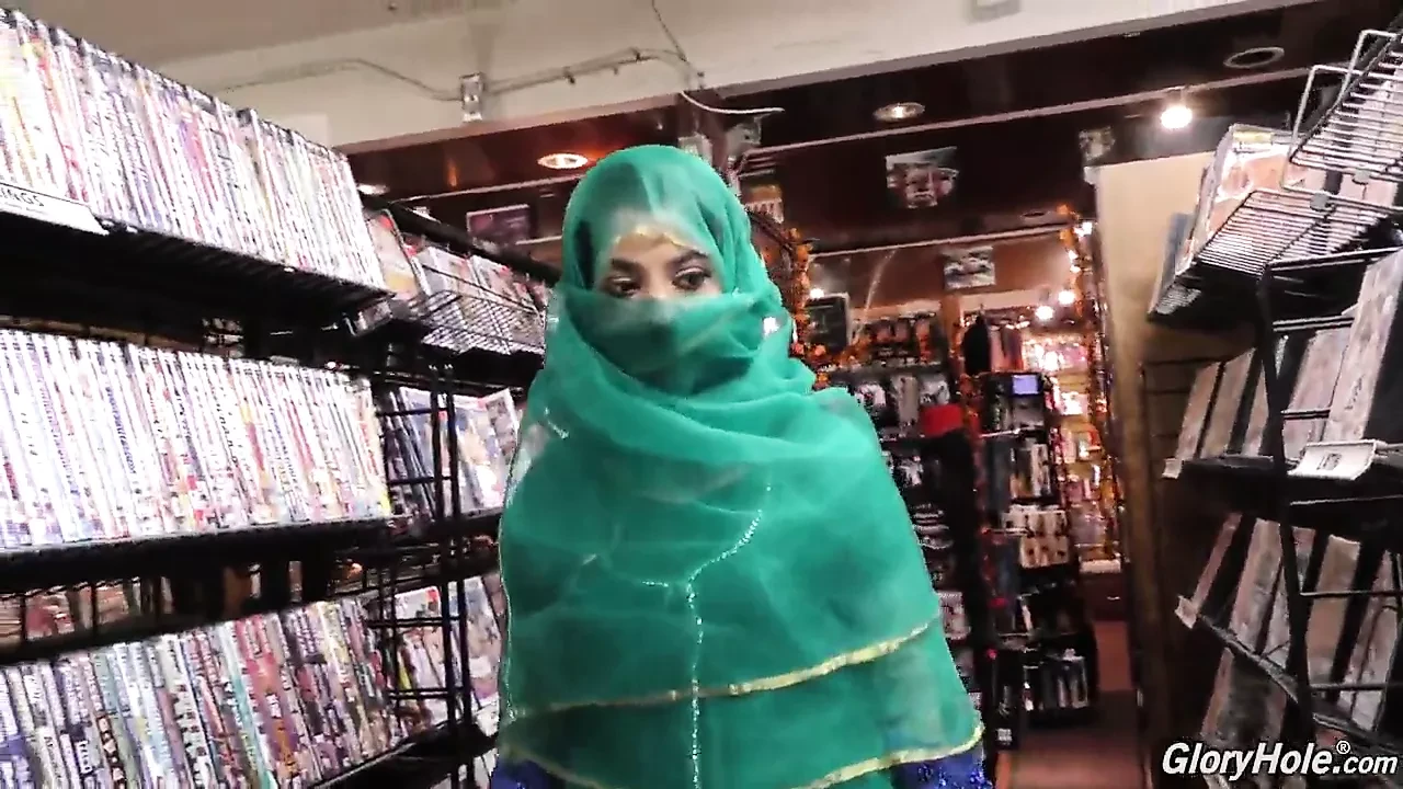 Exotic Arab babe Nadia Ali fucked by black in porn shop
