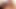 Küçük yarağını yatakta iki seksi bayanla sıvazlatıyor