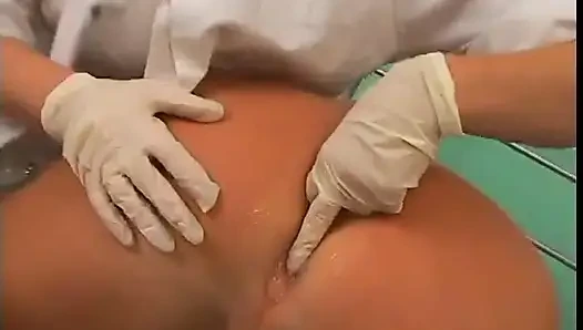 Hot blonde nurse sticks a thermometer in guy's ass in operation room