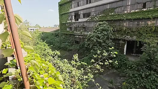 Cute Asian boy masturbates, moaning, ejaculating, and swallowing semen in a sunlit abandoned factory