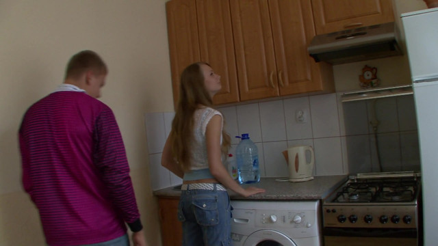 Teen has rough fuck in the kitchen with older guy