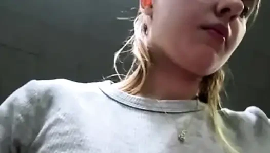 Public masturbation: A horny beauty at the FIT gym massages her pussy and cums on a bench in the locker room.