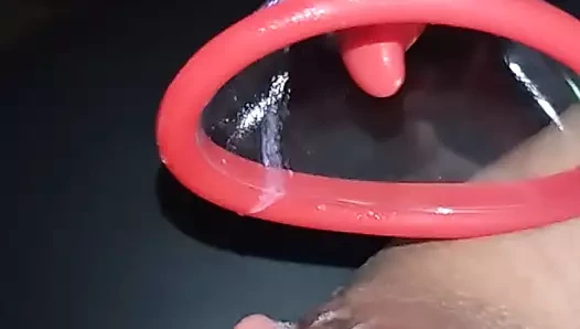 Wet horny MIILF's pussy with red toy