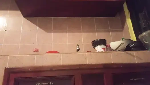 Chubby mom in the kitchen showing thong 2