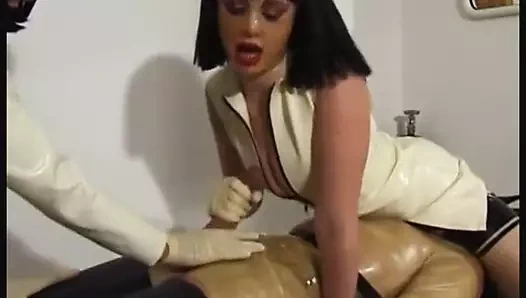 Two Slutty Masked Latex Nurses Jerk Off Helpless Patient