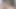 Minyon kız şehvetli bir şekilde vücuduyla oynarken sigara içiyor