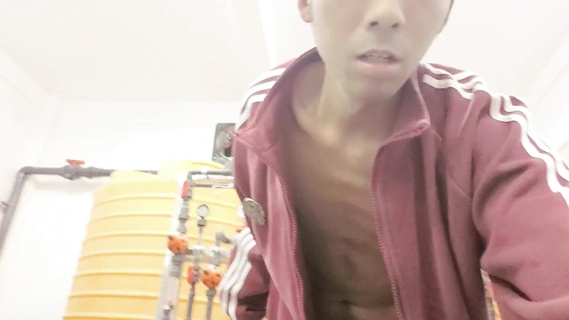 A mischievous Asian boy masturbates, moaning, ejaculating, and consuming semen in a factory laboratory