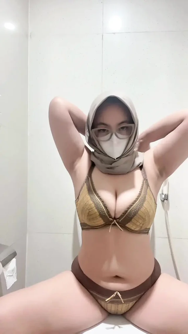 Brutal busty girl in bikini masturbates using squirt tipped dildo