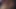 Zenci hatun orta yaşlı seksi kadın göğüslerine dokunurken esmer arkadaşının amını sikiyor