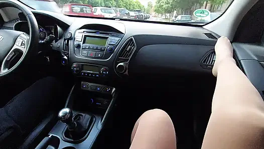 Sexy mature milf in stockings teases a taxi driver in the car