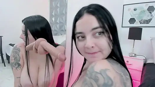 A very horny, busty Latina licks and sucks her dildo in front of the mirror part 1