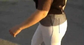 Sexy blonde Girl in skintight jeans and on high heels