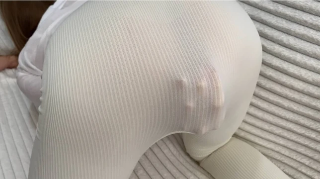 Pink Surprise Under White Leggings. White Outfit Tease