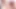 Seksi genç kız yatakta küçük göğüsleriyle oynuyor
