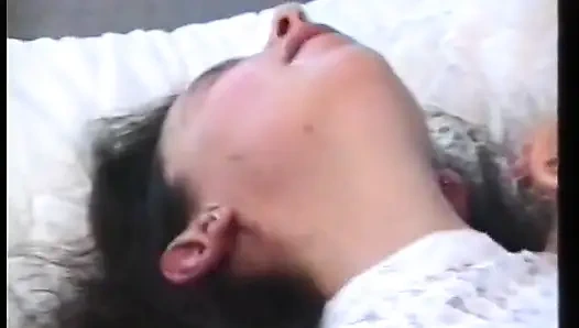 Horny bitch in sexy stockings is fingering her hairy cunt