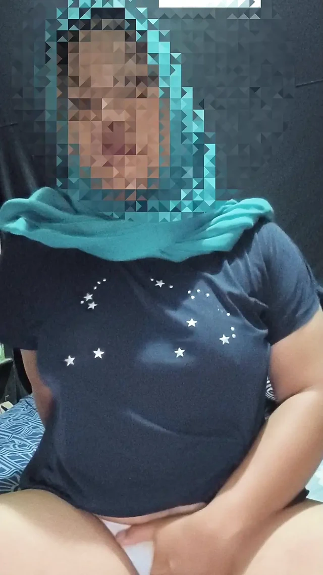 Blue hijab Muslim woman with seductive black t-shirt