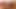 Seksi kız uzun bir dildoyla sıkı amını sikerken inliyor
