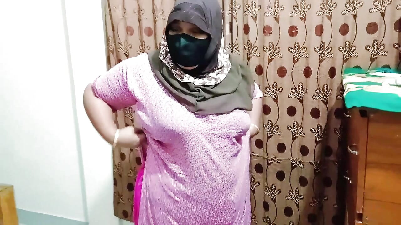 Hijabi girl takes off her clothes and wears a saree. Those big breasts are visible.