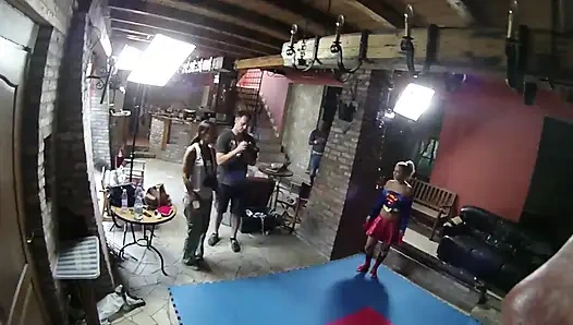 Supergirl wrestling in livingroom