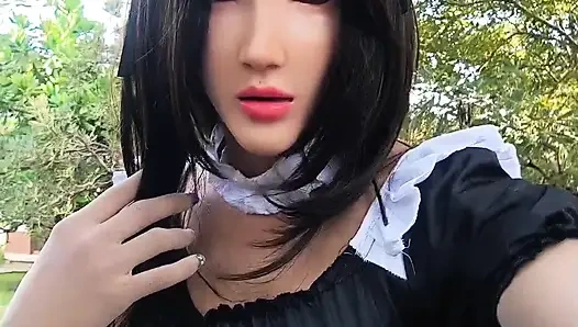 The sister wears a mask and shows off.