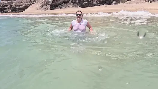 Girl Wetting Jeans in the Ocean and Swimming in Wet White T-shirt