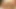 Çekici sarışın bebek çalısıyla oyuncak yapıyor
