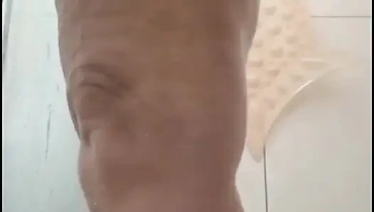 My stepmom taking a shower after fucking, to get the cum out of her.